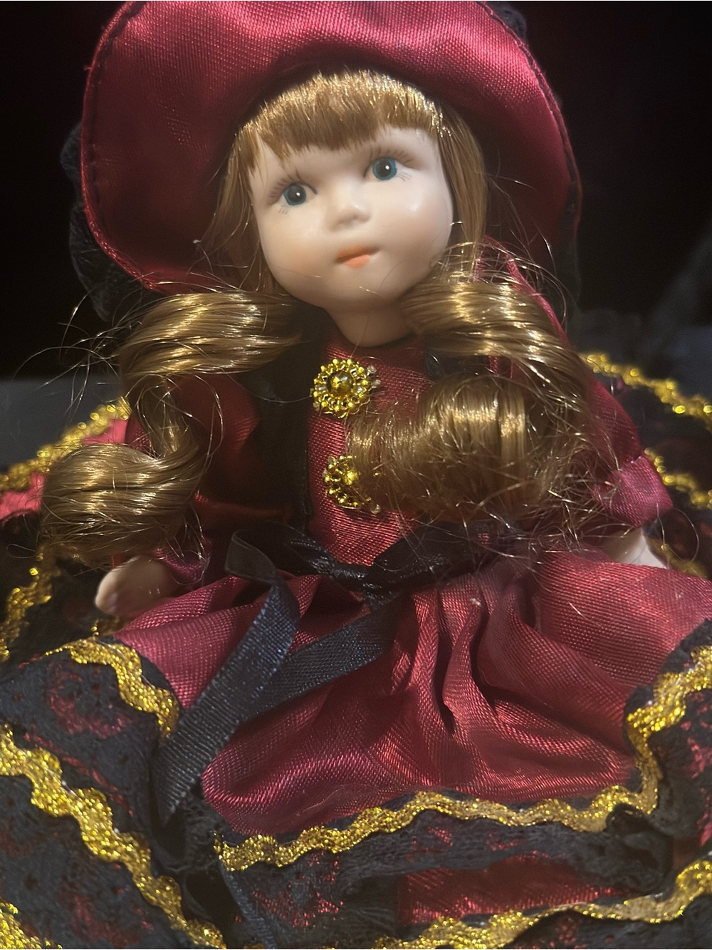 Porcelain Collectible Doll in Burgundy and Black - Picture 8 of 9